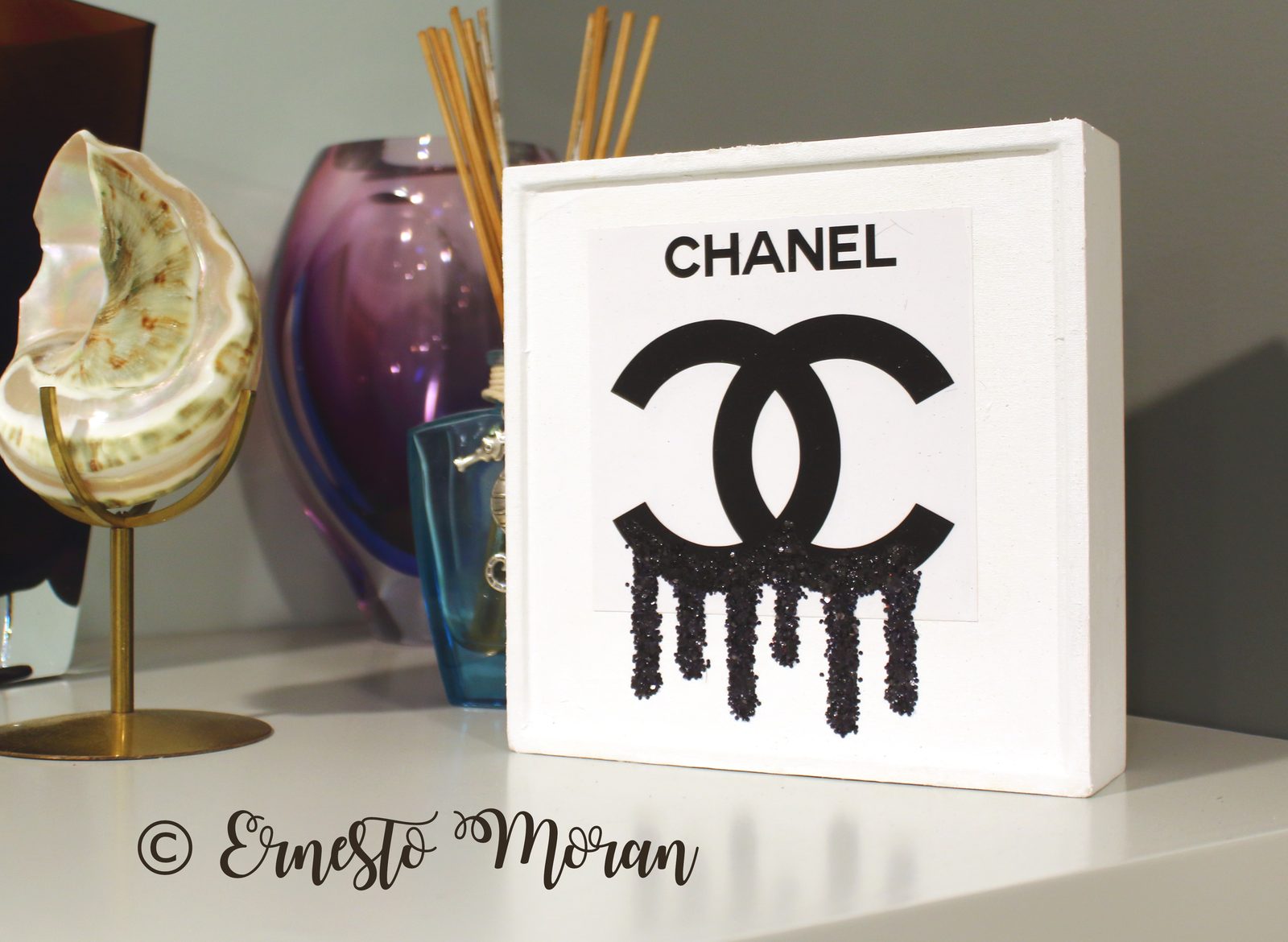 Chanel logo canvas with black glitter drip